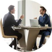 Techpullers mobile app development team in Kochi discussing testing and development at a meeting table