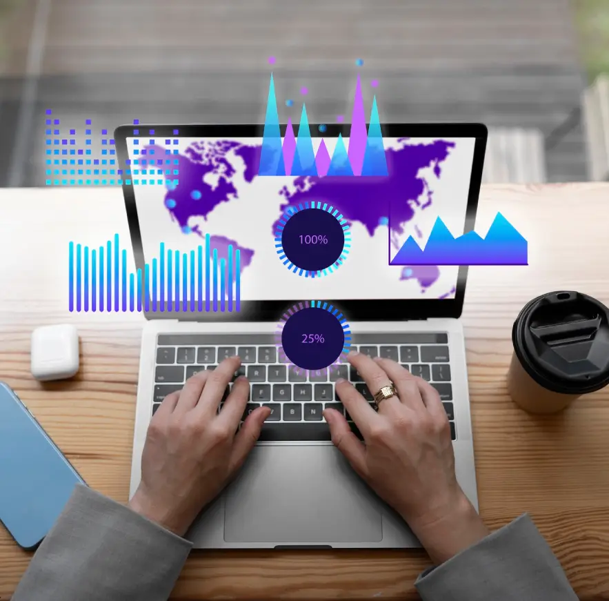 Close-up of hands typing on a laptop with a screen displaying advanced data analytics and colorful graphs, symbolizing sophisticated digital marketing analysis.