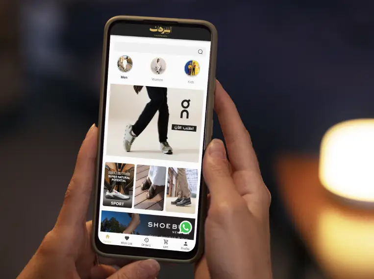 Image showing a mobile phone screen displaying a shopping app, highlighting the brand awareness and customer engagement strategy for Al Sirhan Shoes implemented by Techpullers.