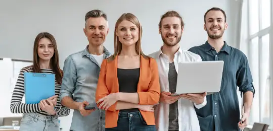 Group of diverse team members standing together, highlig