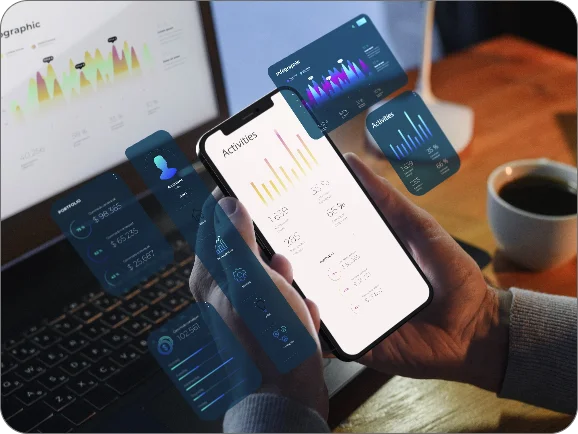 Mobile app development services by Techpullers - person using smartphone with analytics dashboard and UI designs, showcasing Android and iOS app solutions.